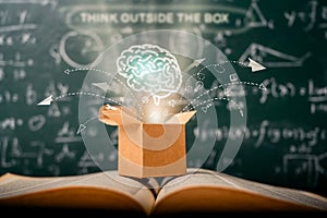 Think outside the box on school green blackboard . startup  education concept. creative idea. leadership photo