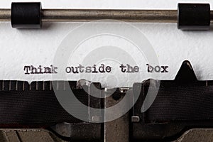 Think Outside The Box text on the typewriter