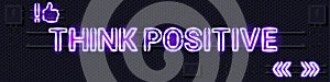 THINK POSITIVE glowing purple neon lamp sign on a black electric wall