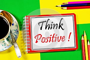 Think positively. Text label in the to-do planning Notepad. photo