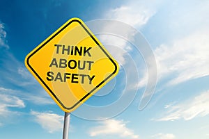 Think about safety road sign with blue sky and cloud background