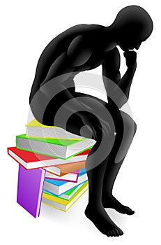 Thinker thinking sitting on books