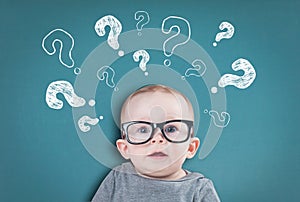 Thinking baby with questions