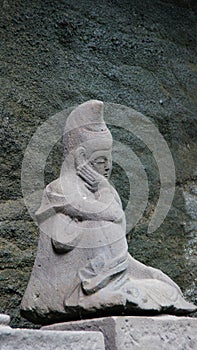 Thinking Buddha statue at Nihon ji temple in Japan photo