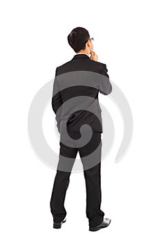 Thinking businessman isolated on white background