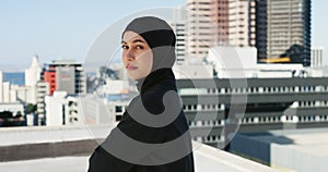 Thinking, city and portrait of Muslim girl on rooftop with ideas, vision and contemplating. Beauty, empowerment and