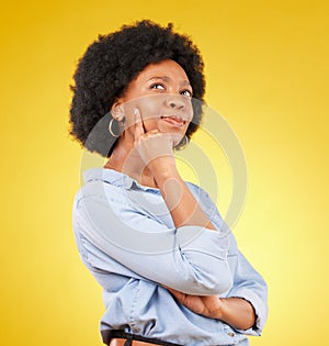 Thinking, confused and black woman in studio pensive, puzzled and uncertain on yellow background. Doubt, contemplate and