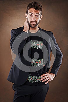 Thinking, confused and portrait of businessman in studio with fashion, questions or how to guess on brown background