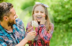 Thinking of ecology. little girl and happy man dad. earth day. spring village country. family summer farm. ecology