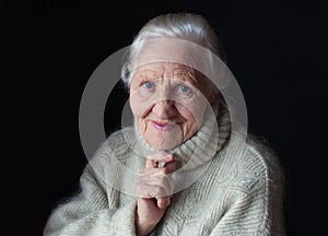 Thinking elderly woman