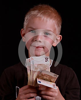 Thinking kid holding euro.