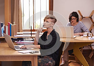 Thinking, laptop and woman student in library for studying, planning and brainstorming for assignment. Ideas, question