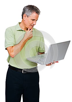 Thinking man using a laptop