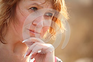 Thinking middleaged woman