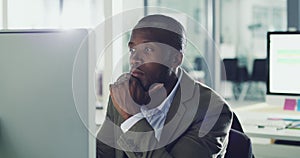 Thinking, serious or black man on computer for company strategy, reading news blog or internet content in office. Focus