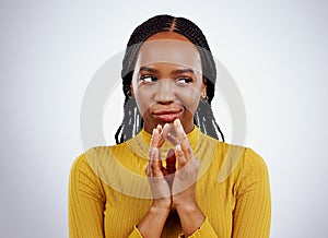 Thinking, smirk and black woman with scheme hands in studio for evil, planning or revenge on grey background. Plotting