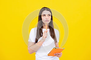 Thinking student. Portrait of student woman. College or high school ducation. Serious young woman with notebooks at