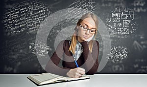 Thinking student sitting at a desk