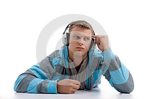 Thinking young man with headphone