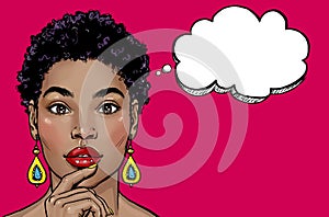 Thinking young sexy woman.Pop Art girl is thought and holding hand near the face. African female model on red background.