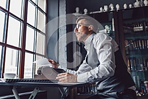 Thinking young writer at work