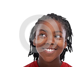 Thinking, youth and smile with boy black child in studio isolated on white background for growth or development. Face
