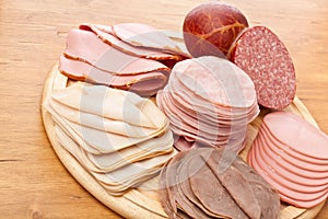 Thinly sliced meat on white background
