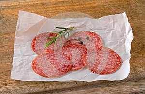 Thinly sliced salami sausage