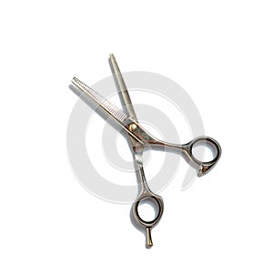 Thinning barber scissors isolated on white background. Beauty and fashion