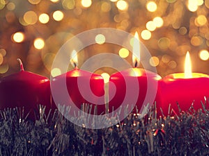 Third Advent candleburning Christmas concept