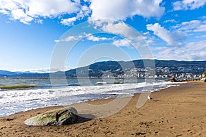 Third Beach, Stanley Park Seawall. West Vancouver cityscape in the background.