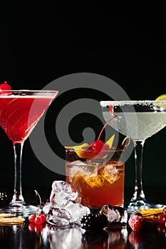 thirst quenching cocktails garnished with cherries