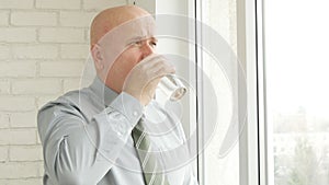 Thirsty Businessman Drinking Glass with Fresh Water