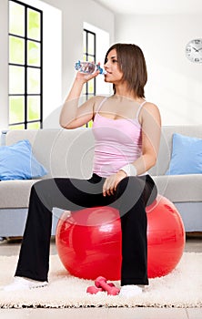 Thirsty fitness woman
