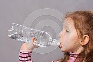 Thirsty girl drinking clean