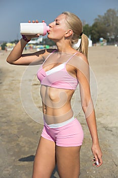 Thirsty girl drinking water