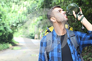 Thirsty man drinking some water