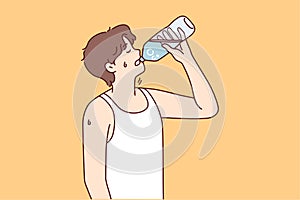 Thirsty man drinking water from bottle