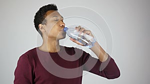 Thirsty Man Drinking Water from Bottle, Feeling Comfortable