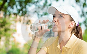 Thirsty woman drinking fresh water