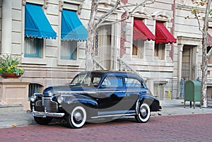 Thirties sedan parked in New York style neighborhood