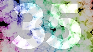 Thirty four to thirty five years birthday fade in/out animation with color gradient moving bokeh background.