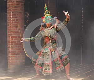 Thotsakan ten faces giant in Khon or Traditional Thai Pantomime as a cultural dancing arts performance in masks dressed photo