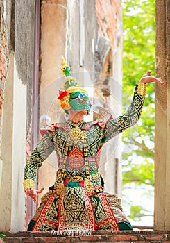 Thotsakan ten faces giant in Khon or Traditional Thai Pantomime as a cultural dancing arts performance in masks dressed photo