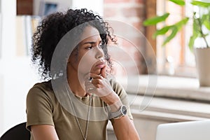 Thoughtful African American businesswoman or student feeling uncertain