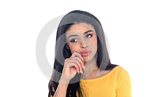 thoughtful african american girl holding hand on chin and looking away isolated