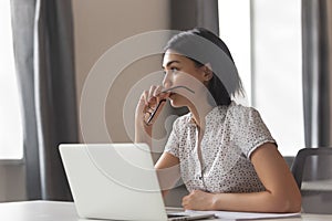 Thoughtful anxious asian business woman looking away thinking solving problem photo