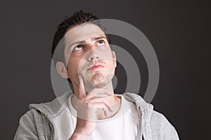 Thoughtful attractive young man - portrait