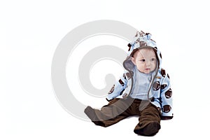 Thoughtful baby boy dressed blue hoodie