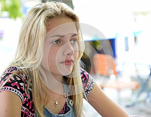 Thoughtful blond girl